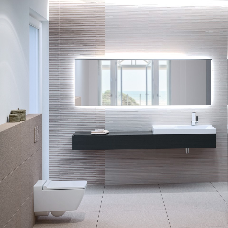 Koupelna s toaletou Geberit Xeno² bez splachovacího okraje, s ovládacím tlačítkem Sigma70 a umyvadlem