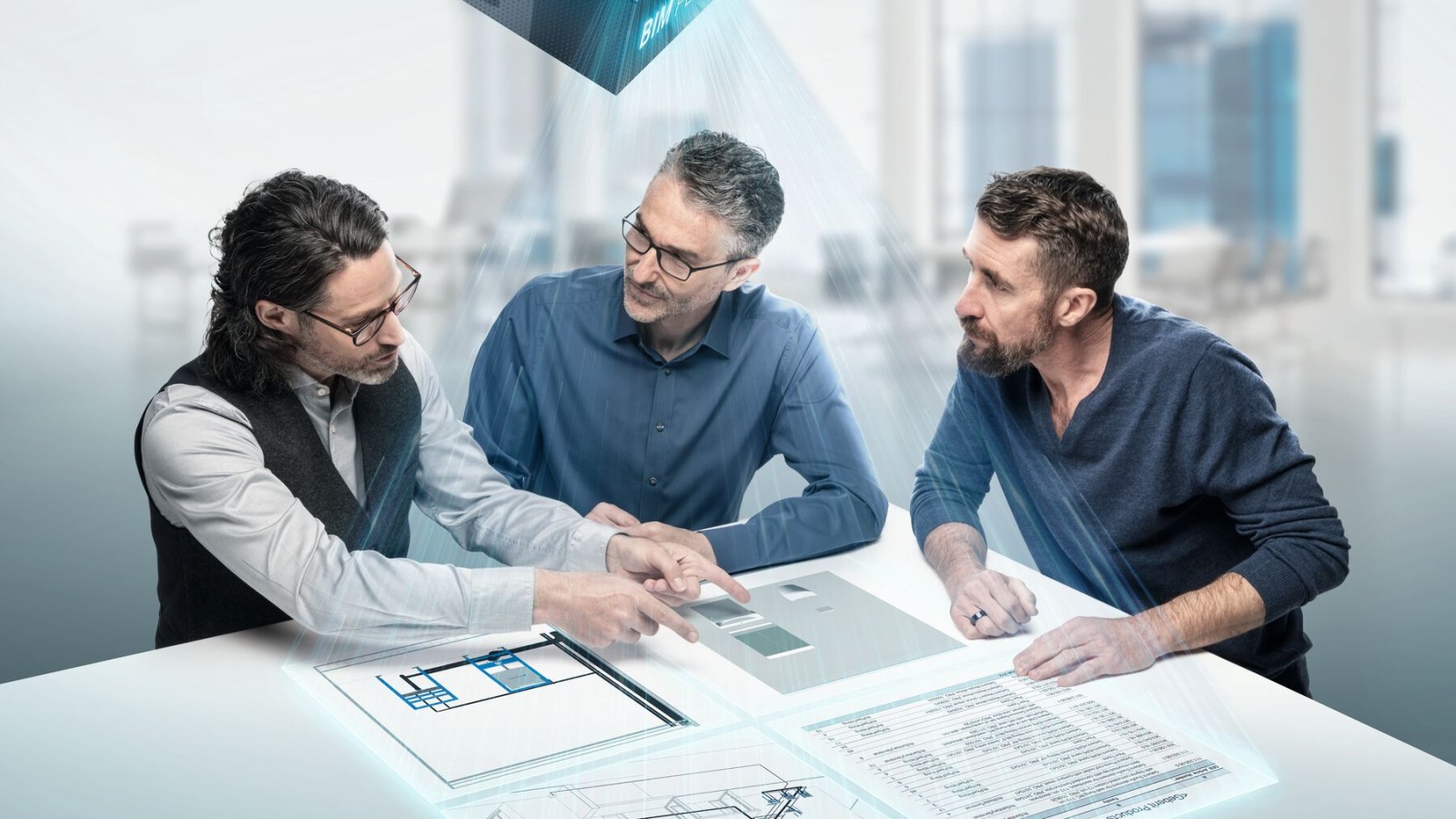 Projektanti v intenzivní diskusi u stolu se symbolem BIM