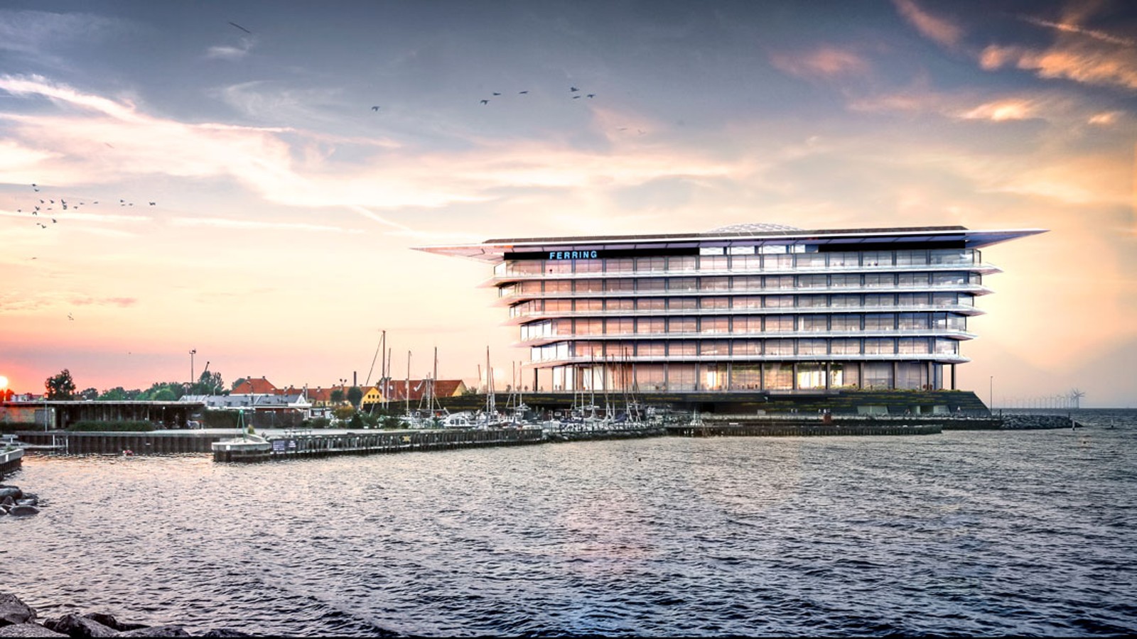 Vznášející se ostrov: nové sídlo farmaceutické společnosti Ferring Pharmaceuticals v dánském Kastrupu. Vznášející se ostrov: nové sídlo farmaceutické společnosti Ferring Pharmaceuticals v dánském Kastrupu.